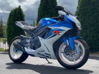 Blue and Pearl White in showroom condition. Original owner. No scratches, or dings. Never raced, dro...