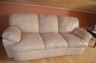 Two comfy leather couches in brand new condition, View more