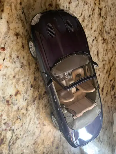 This model is in perfect condition no damage at all, doors, hood, and trunk all open