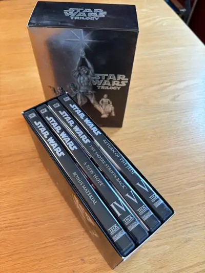 Relive the epic saga with this Star Wars Trilogy DVD set, featuring Episodes IV, V, and VI plus bonu...