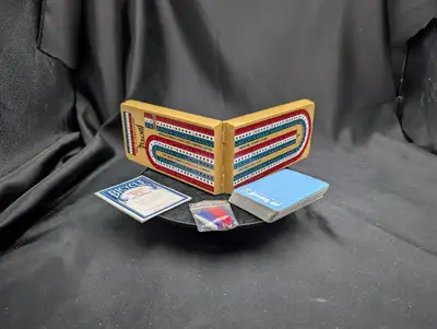 A Bicycle 3 Lane Racetrack Style Folding Cribbage Board and Cards. The set features a classic race-t...