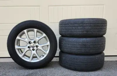 Four (4) Original OEM Jeep Cherokee aluminum rims with system (TPMS) Tire Pressure Monitoring Sensor...