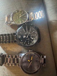 3 Men’s Nixon watches. 