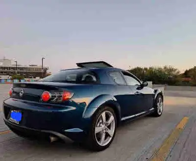 6 speed manual. Grand Touring Trim, Phantom Blue Mica exterior 9/10, black interior 9.5/10. 112000 k...