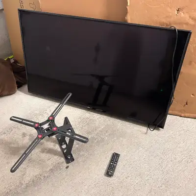 LG 55" 4K Smart TV, wall mount, remote, View more