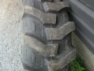 24.9x24 tire and rim and tube $425.00 phone 902-757-2285