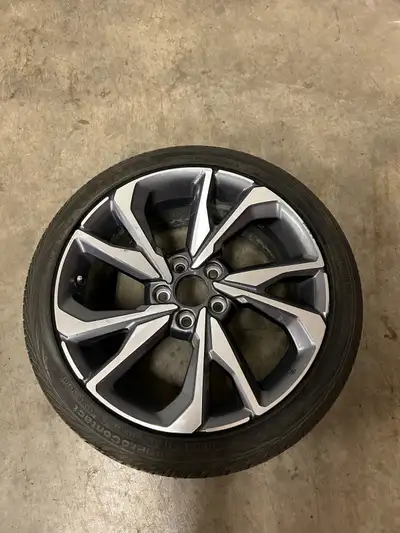 Selling a single Honda Civic tire and rim, perfect as a spare or replacement. The tire is a Continen...
