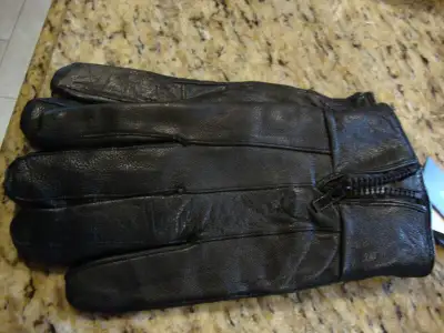 Selling a Brand New pair of Men's Leather Gloves - Black. The brand is Mountain Ridge. They are size...