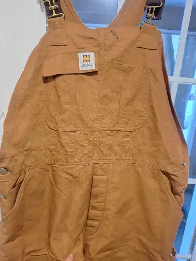 I'm offering a pair of Millworks MFG coveralls, size 44x30, made in Canada from 100% cotton shell wi...