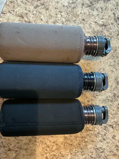 Three stainless steel water bottles with insulator sleeves, View more