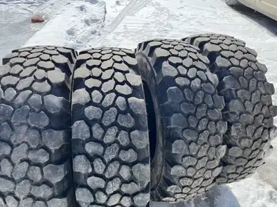 4 tires 335/80R20. Very attractive tires with lots of life left. 13.5" wide x 42" high. Purchased ne...