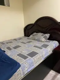 Queen size bed with mattress and two side tables 