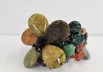 Bracelet: Floral Cluster of polished stones. 3" wide. $45, View more