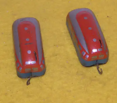 Rare 2 Metal Wind Up Trains with stop switch. Made in Germany US Zone 1950s - Size: 3"x1.1/4"x1.1/4"...