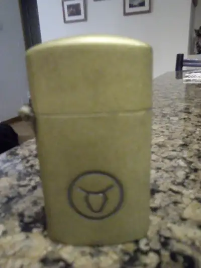 It's not a Zippo but is designed the same. Used once or twice, flint would be considered new since I...