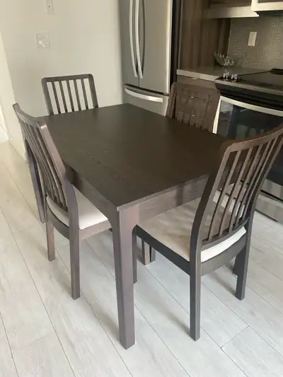 Selling the dark brown Ikea Ekadalen extendable table (chairs not included). Perfect for 4-6 people...
