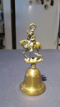 Antique brass bell 6" high.