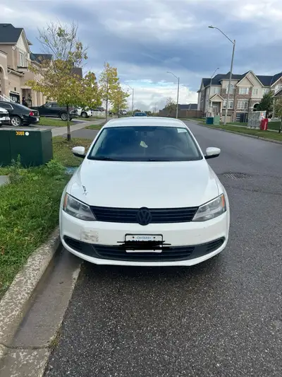 Selling 2014 Volkswagen Jetta, don’t need it anymore. Has small damage on front bumper, rust on lowe...