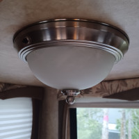 Gently used, matching 12V RV ceiling lights.