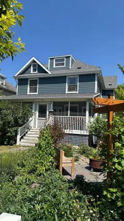 Spacious 2-Bedroom Main Floor Unit with Sunroom – Prime Central