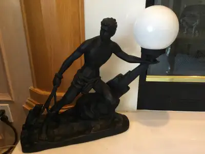 Add a touch of vintage elegance to your space with this rare Art Deco torche lamp, featuring a semi-...