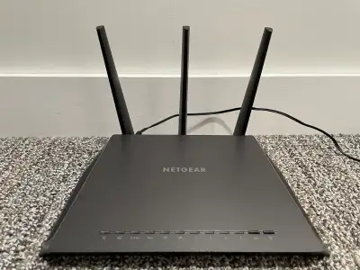 Dual-Band Smart WiFi Router designed for high-performance gaming, streaming, and smart home connecti...