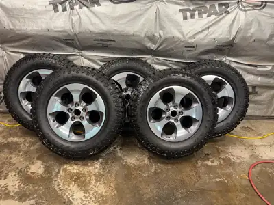 A complete set of 5 Jeep Wrangler OE rims and tires. Still 65% plus on the tires. Will only sell as...