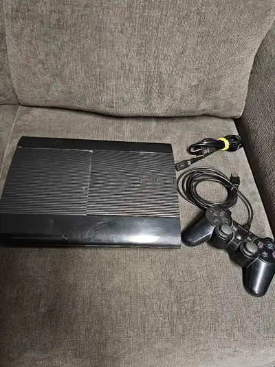 Playstation 3 super slim 500gb console. Everything works great besides left analog stick has to be p...