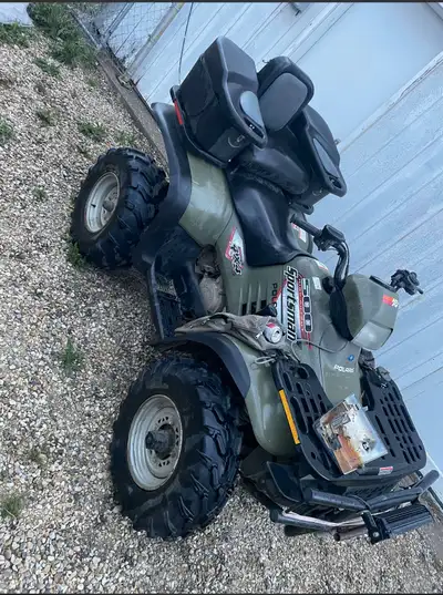 2003 Polaris sportsman 500 runs great, just replaced the drive belt, quad needs a battery and the ri...
