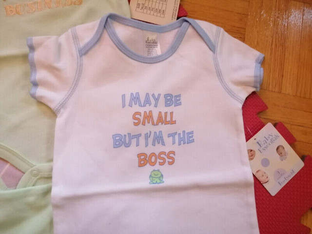 NEW: Set of 4 Baby Essentials Bodysuits (2 x 3 mths, 2 x 9 mths) in Clothing - 6-9 Months in Mississauga / Peel Region
