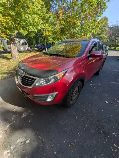 2013 Kia Sportage 129000km Runs great, new brakes, comes full set of with summer + winter tires on r...