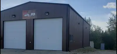 superior steel building out of Edmonton built this shop,fireproof walls on side ,clad 8 " insulation...