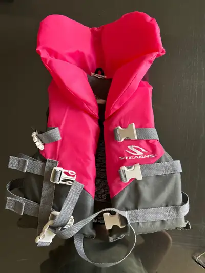 Stearn child/enfant life jacket, pink. 30-60lbs. Used once or twice, like new. In excellent conditio...