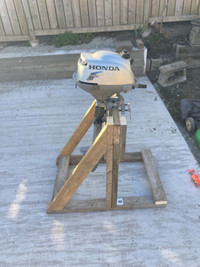 Outboard motor stands