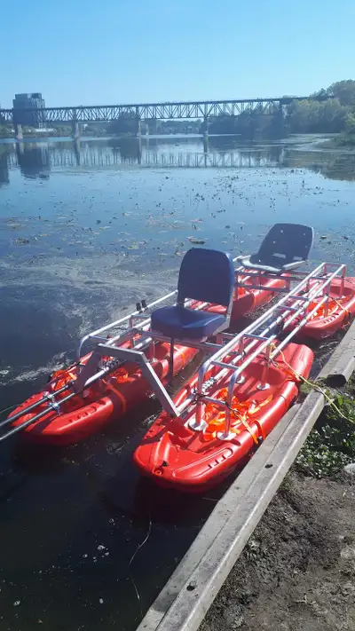 kayak watercraft, fishing kayak, with aluminum rails connecting four (4) youth kayaks. Complete with...