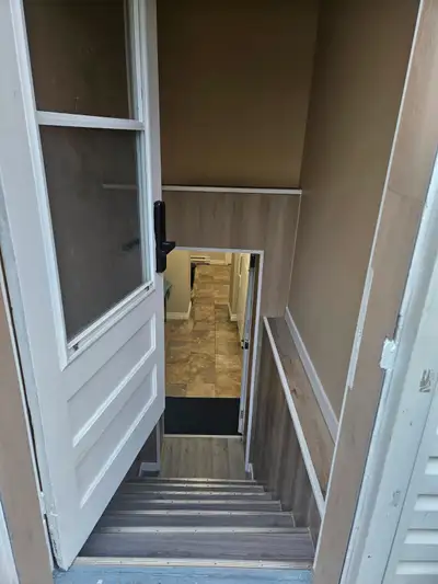This cozy basement offers a furnished 1-bedroom, full bathroom, modern kitchen, private entrance, an...
