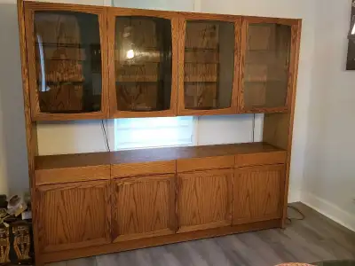 Excellent condition, solid oak, two piece large wall unit/display cabinet. Heavy and solid. Dimensio...