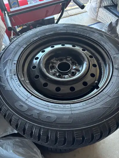 Used 1 winter , Toyo winter tires 215/70R16 fits Rogue SUV . Can’t buy better tires and rims for tha...