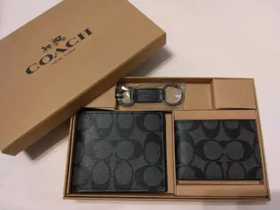 Coach wallet set Boxed 3-In-1 Wallet Gift Set In Signature Canvas Selling for $50 cash. Mine is bran...