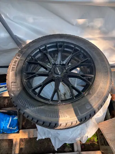 Like new RTX rims and snow tires. Used only 1 season. Rims were $250 each new. Selling all 4 rims an...