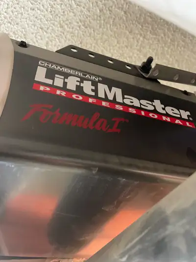 Lift master belt driven standard door opening. Upgraded to a Side winder. Works great. Lifted a 16’x...