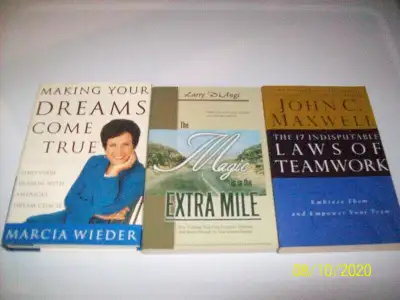 1) Making your Dreams come True by Marcia Wieder hard cover $35. 2) The Magic is in the Extra Mile b...