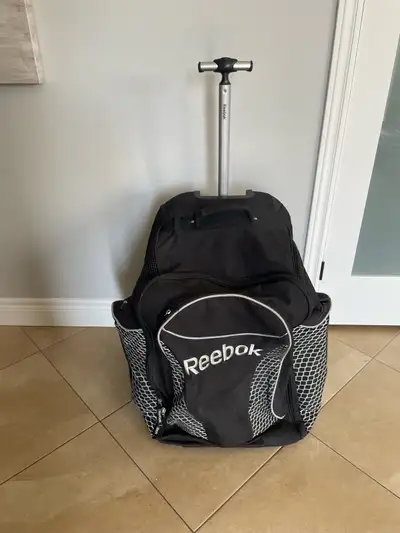 Reebok 18k wheeled and backpack hockey bag Vented main and skate compartments Can be wheeled or used...
