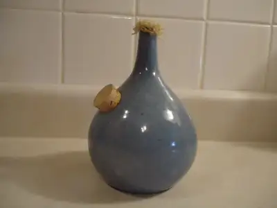 Ceramic Oil Lamp. Perfect condition. Six inches high, four inches wide.