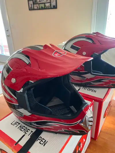 His and Hers. Brand new. Still have tags and cover bags. Xl and Large. Good looking helmet.75$ for o...
