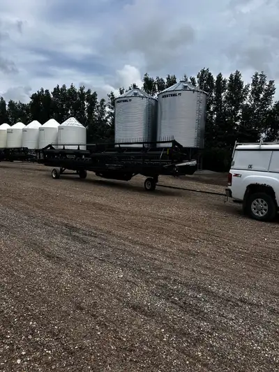 2004 36’ Macdon 963 stright cut header, Polly pick up fingers, fore and aft, split reel, build in tr...