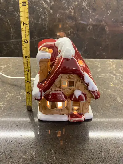 If ad is still posted, it's still available. Price is Firm. Christmas village. Gloss glazed finish....