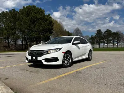 For sale! 2018 Honda civic LX white Some of the features include: -2.0L 4-cylinder engine -Rearview...