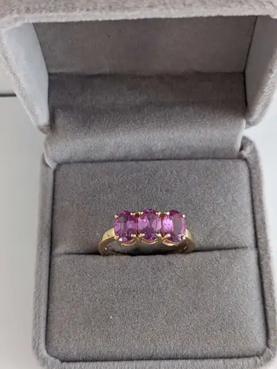 Add a touch of vintage inspired elegance with this gold-plated sterling silver ring featuring three...