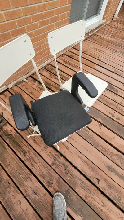 Car booster seat for kids. With handles and security buckles to fix into the car seats. In good cond...